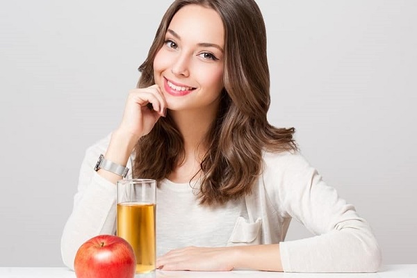 اهمیت مصرف آب سیب